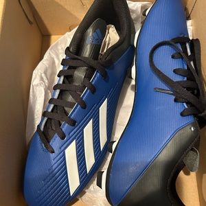 Adidas size 9 men’s soccer cleats, new in box, never worn.